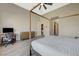 Vaulted ceilings in the main bedroom featuring a four-poster bed and modern design at 12422 Tudor Arch Dr, Las Vegas, NV 89138