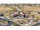 Image of a colorful community playground shaded by modern sunshades with walking paths and green space at 12422 Tudor Arch Dr, Las Vegas, NV 89138