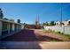 Expansive backyard with gravel landscaping, a patio, and a block wall offering privacy at 1254 Melville Dr, Las Vegas, NV 89102