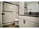 Bathroom featuring new shower and vanity with black hardware at 1254 Melville Dr, Las Vegas, NV 89102