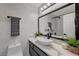 Modern bathroom featuring a vessel sink, quartz countertop, and stylish black fixtures at 1800 Edmond St # 215, Las Vegas, NV 89146