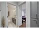 A view of the bathroom and bedroom showcasing modern finishes and stylish design throughout the home at 1800 Edmond St # 215, Las Vegas, NV 89146