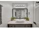 Bright bathroom featuring a vessel sink, modern mirror, and stylish gray vanity at 1800 Edmond St # 215, Las Vegas, NV 89146