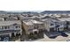 Aerial view of the house with a view of the neighborhood, the solar panels, and the mountains in the distance at 183 Baru Belin Ave, Las Vegas, NV 89183