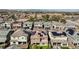 Panoramic aerial shot of a suburban area featuring homes equipped with efficient solar panels on the roof at 183 Baru Belin Ave, Las Vegas, NV 89183