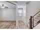 Hallway features wood-look flooring and views to the living area at 183 Baru Belin Ave, Las Vegas, NV 89183