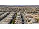 Extensive aerial view showing an area populated by homes, many with solar panel installations on their roofs at 183 Baru Belin Ave, Las Vegas, NV 89183