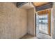 Functional mud room entryway with a sturdy security gate, featuring durable flooring for ease of maintenance at 211 N Lamb Blvd # C, Las Vegas, NV 89110