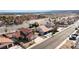 Scenic aerial shot of a neighborhood featuring a terracotta roof and a large street at 2111 River City Dr, Laughlin, NV 89029