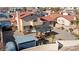 Aerial view of a private backyard featuring a pergola, patio, and desert landscaping at 2111 River City Dr, Laughlin, NV 89029