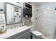 Modern bathroom with a sleek vanity, updated tile, and a spacious shower at 2111 River City Dr, Laughlin, NV 89029