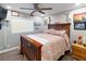 Cozy bedroom with a comfortable bed, wood floors, and plenty of natural light at 2111 River City Dr, Laughlin, NV 89029