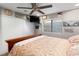 Comfortable bedroom featuring a ceiling fan, closet, and a window for natural light at 2111 River City Dr, Laughlin, NV 89029