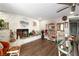 Bright living room with stone fireplace, wood floors and ample space for entertaining at 2111 River City Dr, Laughlin, NV 89029