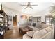 Comfortable living room with wood floors, neutral colors, and bright natural light at 2111 River City Dr, Laughlin, NV 89029