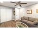 Relaxing living area features hardwood floors, modern ceiling fan and closet space at 2111 River City Dr, Laughlin, NV 89029