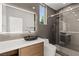 Modern bathroom featuring a sleek vanity, vessel sink, and glass-enclosed shower at 2293 Buckingham Ct, Henderson, NV 89074