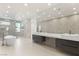 Spacious bathroom featuring double vanity, large mirror and marble accents at 2293 Buckingham Ct, Henderson, NV 89074