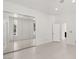 Modern bedroom with mirrored closet doors, white walls, and recessed lighting at 2293 Buckingham Ct, Henderson, NV 89074