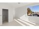 Sunlit bedroom featuring a walk-in closet and a large window with views of the neighborhood at 2293 Buckingham Ct, Henderson, NV 89074