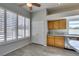 Bright breakfast nook features tile floors, plantation shutters, and ample storage at 230 Pintale Cir, Henderson, NV 89074