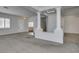 Bright living room with neutral colors, tile floors, and decorative pillars at 230 Pintale Cir, Henderson, NV 89074