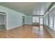 Wood floors flow through this bright sunroom with access to the rest of the home at 230 Pintale Cir, Henderson, NV 89074