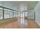 Spacious sunroom featuring wood floors, with lots of natural light and neutral paint colors at 230 Pintale Cir, Henderson, NV 89074