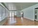 Bright and airy sunroom with wood floors leading into the main home at 230 Pintale Cir, Henderson, NV 89074