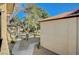 View of lush greenery, sidewalks, and multi-story residential buildings at 2451 N Rainbow Blvd # 2076, Las Vegas, NV 89108