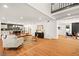 Spacious open-concept living area connecting the kitchen and dining room, perfect for entertaining and Gathering gatherings at 2501 Wimbledon Dr, Las Vegas, NV 89107