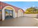 Expansive terrace with tiled roofing and blue-framed entry offers a great outdoor space at 2501 Wimbledon Dr, Las Vegas, NV 89107