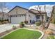 Charming single-story home with manicured landscaping and inviting curb appeal in a sunny setting at 2537 Nashira St, Henderson, NV 89044