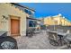 Charming patio area with outdoor furniture and a grill for outdoor entertaining at 2657 Fawn Beige Ct, North Las Vegas, NV 89086