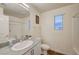 Bathroom with a granite countertop and walk-in shower at 2657 Fawn Beige Ct, North Las Vegas, NV 89086