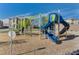 View of neighborhood playground with climbing structures and slides at 2657 Fawn Beige Ct, North Las Vegas, NV 89086