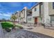 Exterior view of modern two-story townhomes with private patios and landscaping at 2657 Fawn Beige Ct, North Las Vegas, NV 89086