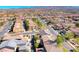 Panoramic aerial shot of a neighborhood displaying well-maintained homes and tree-lined streets, ideal for families at 3204 Romanesque Art Ave, Henderson, NV 89044