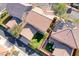 Aerial photograph of the home highlighting the outdoor space, nearby houses and solar panels at 3204 Romanesque Art Ave, Henderson, NV 89044