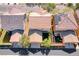 An aerial view showcases the neighborhood's roof, greenery and the proximity of homes at 3204 Romanesque Art Ave, Henderson, NV 89044