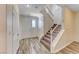 Welcoming entryway with staircase, decorative floors, and natural light at 3204 Romanesque Art Ave, Henderson, NV 89044