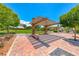 Community park featuring a shaded pergola with benches, perfect for relaxing outdoors at 3204 Romanesque Art Ave, Henderson, NV 89044