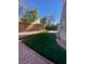 Lush backyard features low-maintenance landscaping and great outdoor living at 3304 Michelangelo Ct, Las Vegas, NV 89129