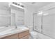 Cozy bathroom with shower-tub combo, single sink and tiled countertop at 3658 Ambergate Ct, Las Vegas, NV 89147