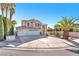 Charming home with a spacious three-car garage and desert landscaping at 3658 Ambergate Ct, Las Vegas, NV 89147