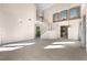 Bright living room featuring high ceilings, ample natural light, and a staircase at 3658 Ambergate Ct, Las Vegas, NV 89147