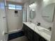 This sleek bathroom features a dual sink vanity with elegant countertops and modern fixtures at 3751 Morning Canyon St, Las Vegas, NV 89147