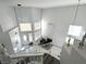 Bright foyer from above, showcasing high ceilings, a modern staircase, and natural light at 3751 Morning Canyon St, Las Vegas, NV 89147