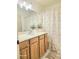 Bathroom features a lovely sink, vanity and a decorative shower curtain at 4006 Morning Peace St, Las Vegas, NV 89115