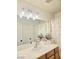 Bathroom features a large mirror, vanity and a decorative shower curtain at 4006 Morning Peace St, Las Vegas, NV 89115